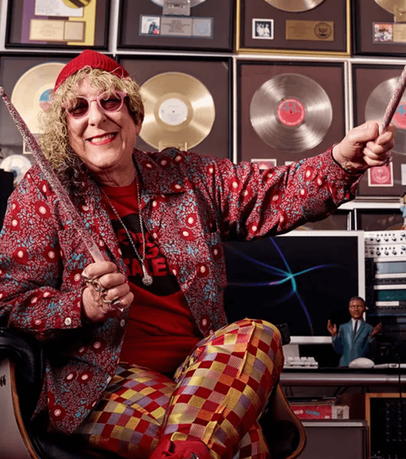 Allee Willis in her studio surrounded by gold records.